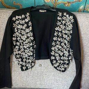 1980s vintage.  Black crop jacket
